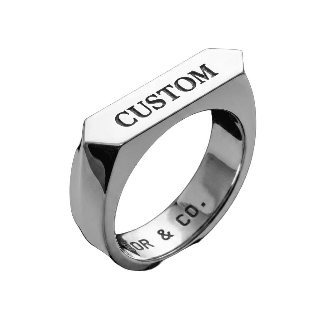 925 sterling silver Leicester signet ring with a custom lettermark engraved into the table, mirror-polished finish, background removed.