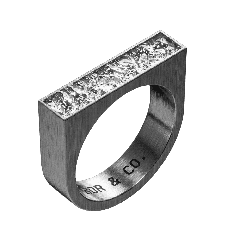 925 sterling silver rectangle signet ring with Grand Canyon terrain relief on the table, brushed finish, background removed.