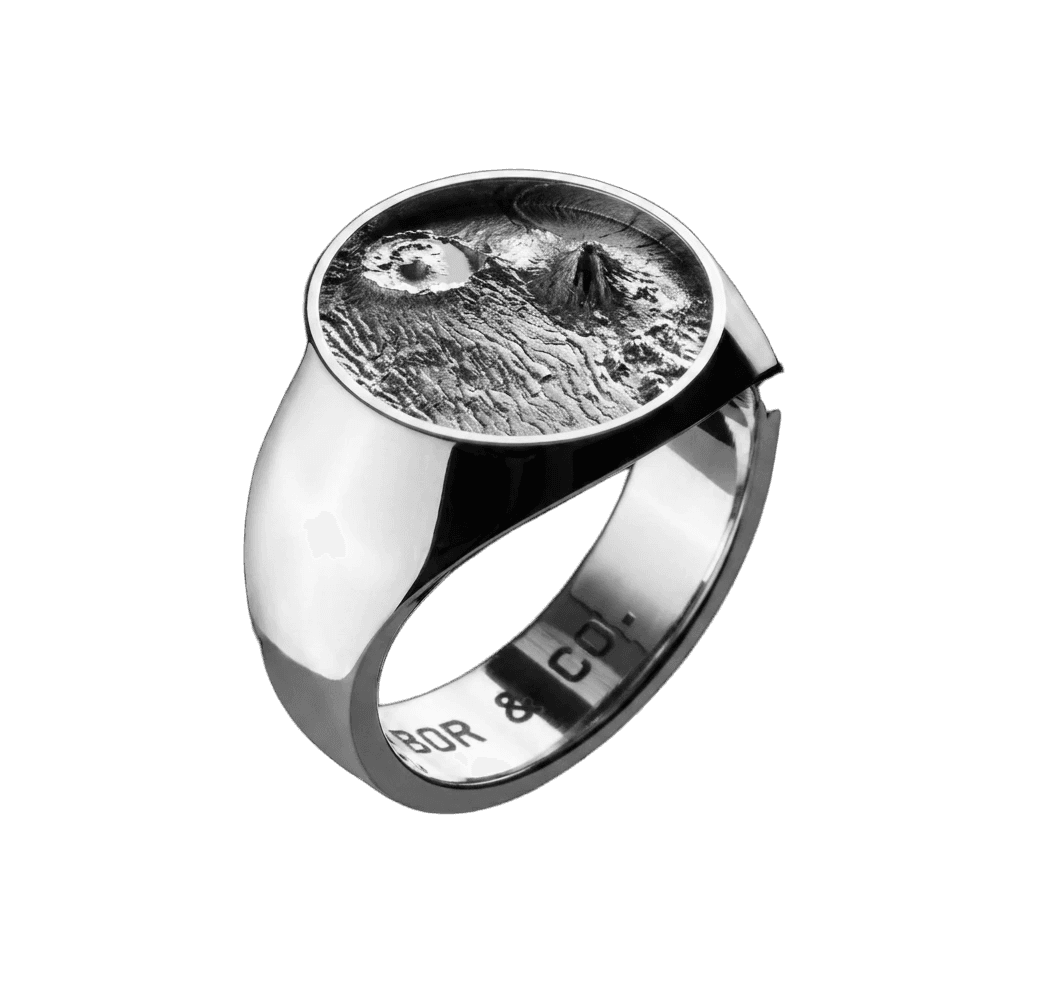 925 sterling silver round signet ring with Mt Agung (Bali) terrain relief on the table, mirror-polished finish, background removed.