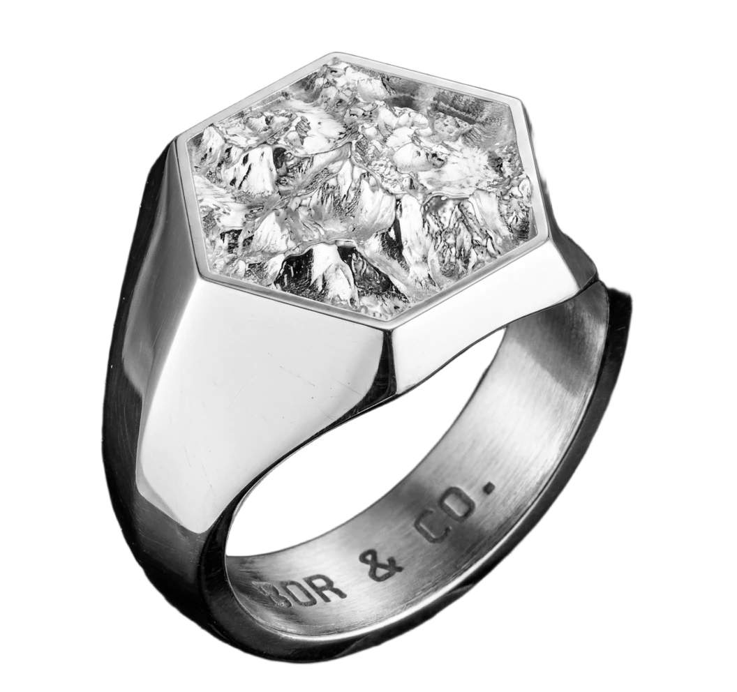 925 sterling silver hexagon signet ring with Mt Everest / Khumbu massif terrain relief on the table, mirror-polished finish, background removed.