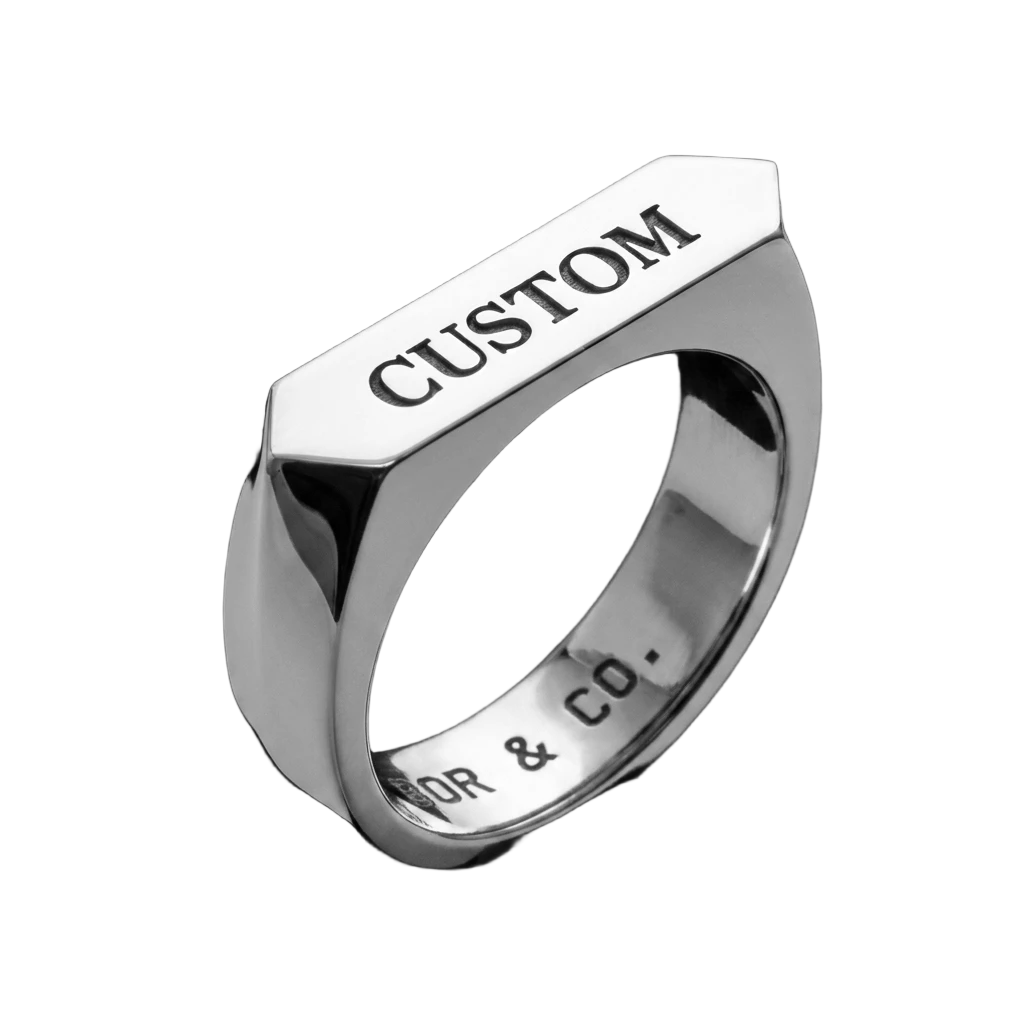 925 sterling silver Leicester signet ring with a custom lettermark engraved into the table, mirror-polished finish, background removed.
