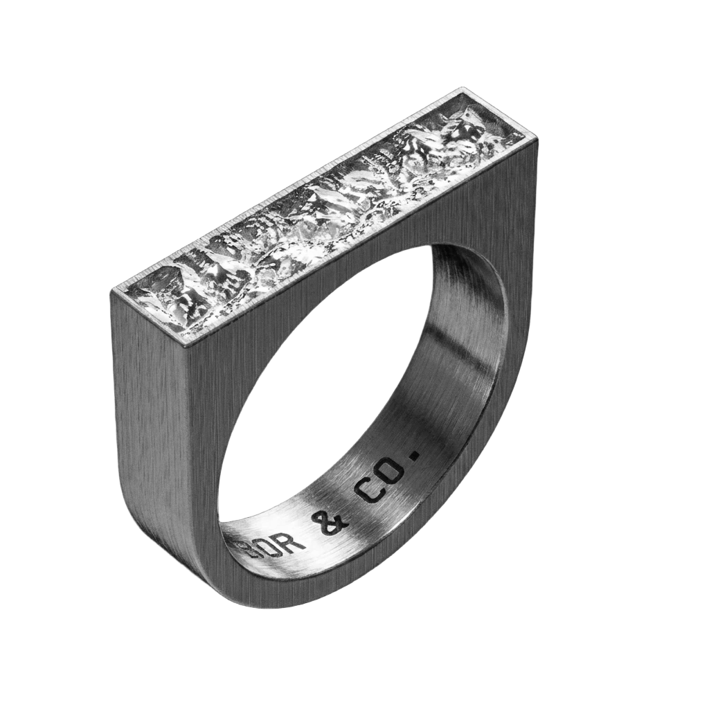 925 sterling silver rectangle signet ring with Grand Canyon terrain relief on the table, brushed finish, background removed.