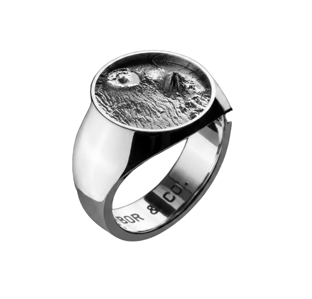925 sterling silver round signet ring with Mt Agung (Bali) terrain relief on the table, mirror-polished finish, background removed.